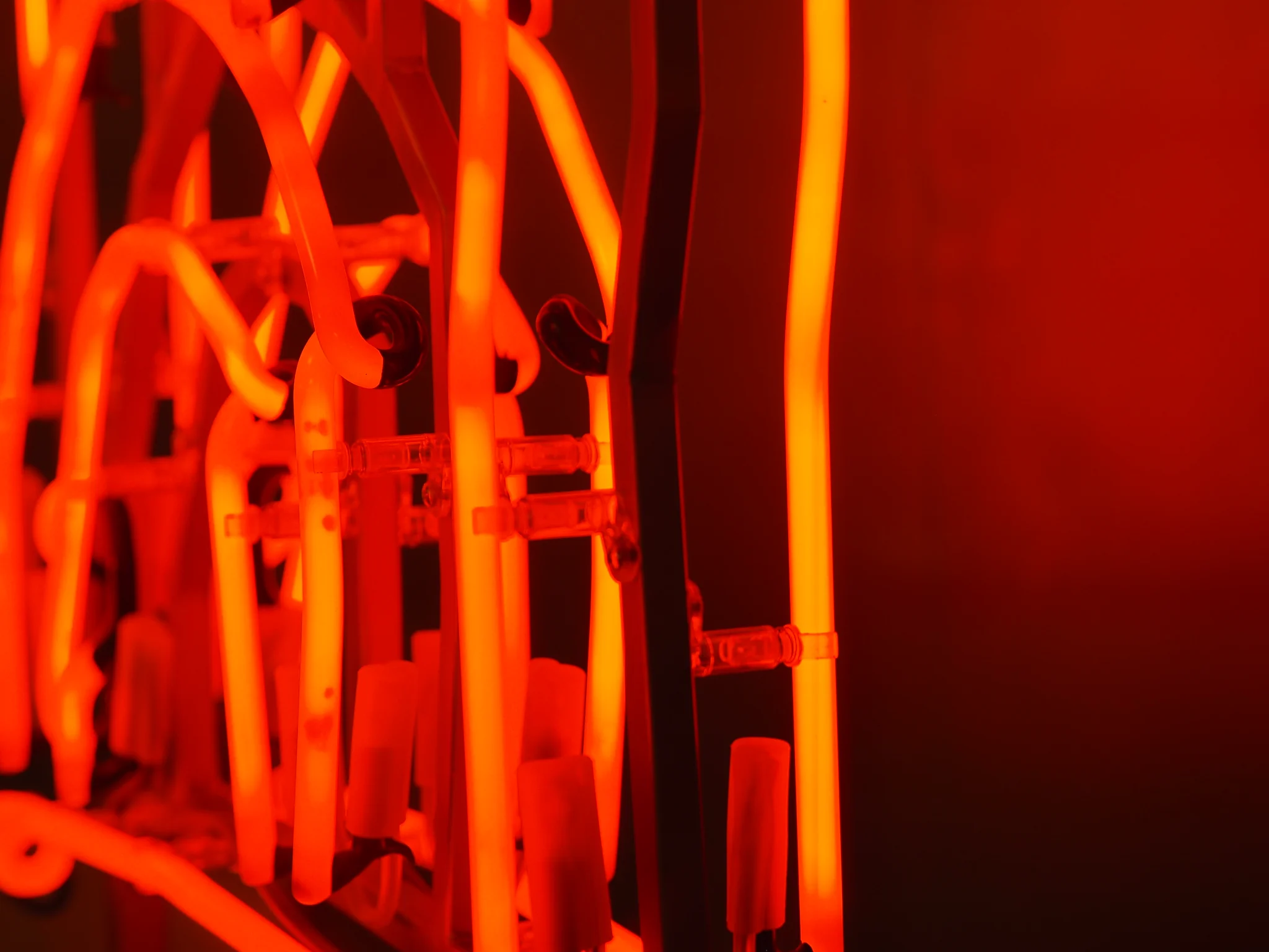 Red neon lights in abstract shapes